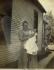 Jennie Cline (1882-1929) holding Hallie Frances Cossell (1917-1918)